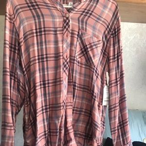 This is a size small. The brand is Time and Tru.